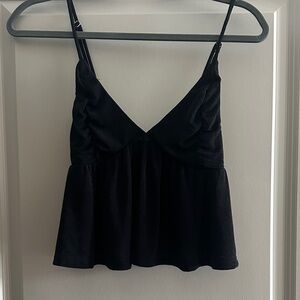 Black peplum crop tank top.